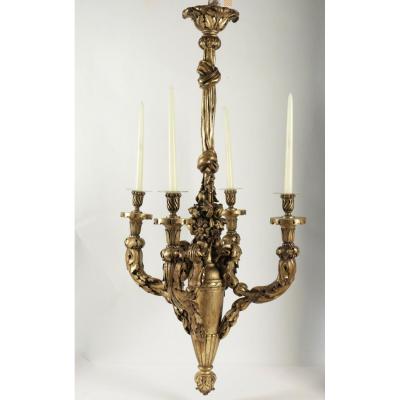 Chandelier In Hand Carved Gold Gilt Wood From The 19th Century. Originally Used With Candles. 