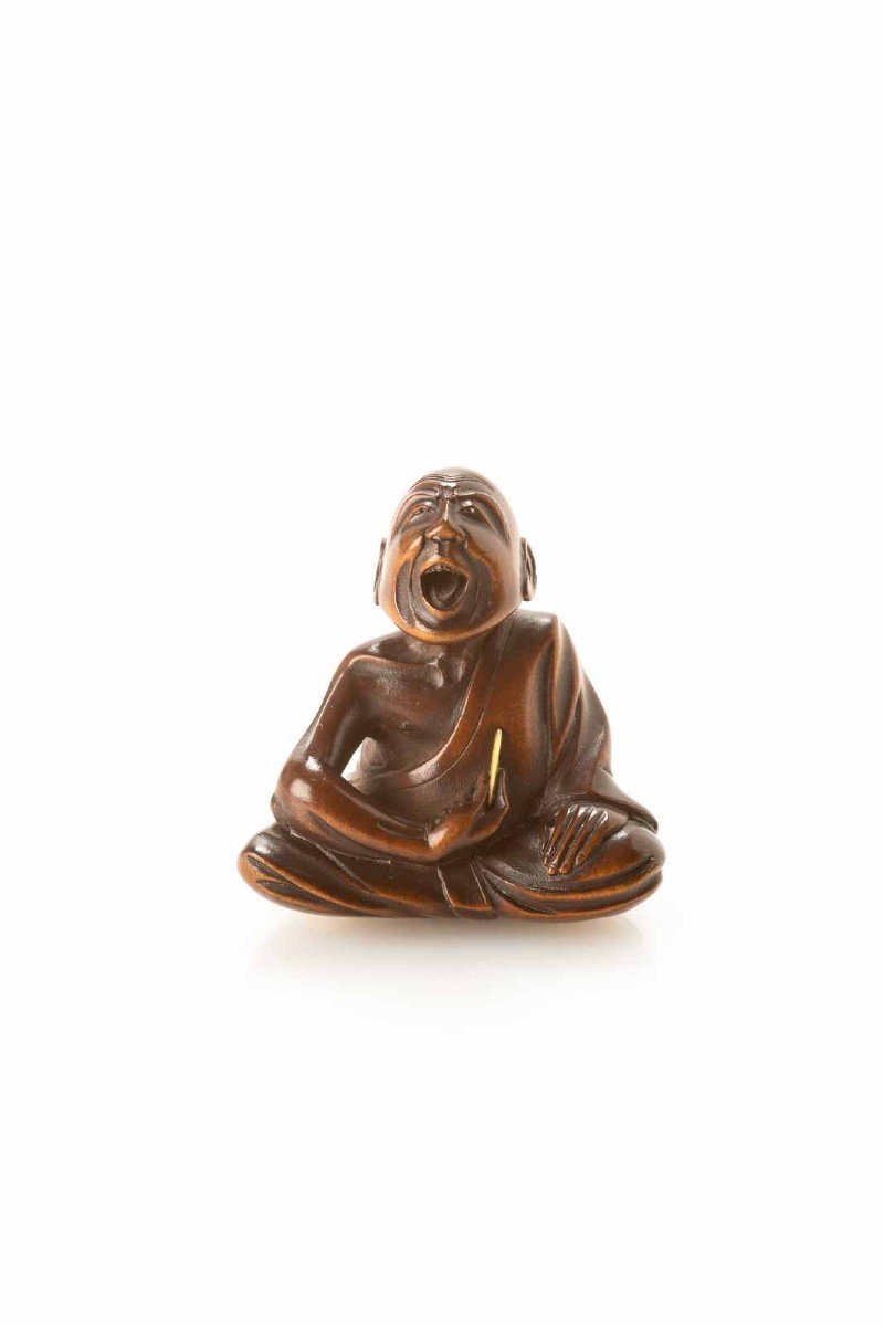 A Japanese Boxwood Netsuke Of A Professional Sneezer