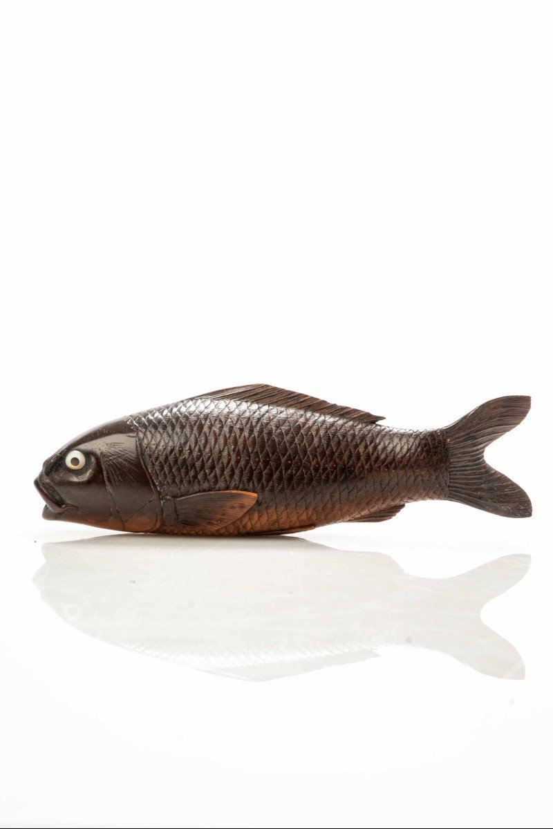 A Japanese Boxwood Okimono Depicting A Koi Carp