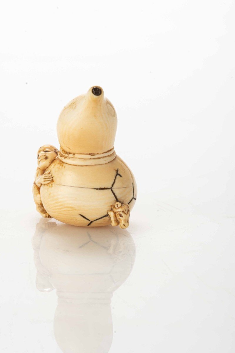 An Ivory Netsuke Depicting Chokaro With Pumpkin And Horse-photo-3