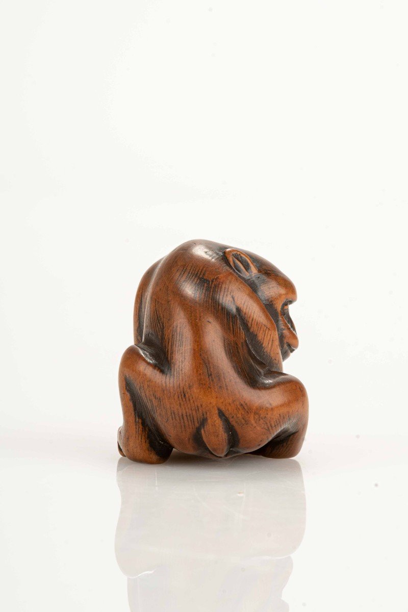 A Japanese Netsuke Depicting A Monkey With A Turtle-photo-1