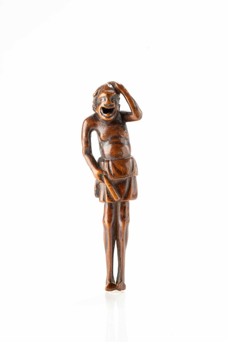 A Boxwood Netsuke Depicting A South Sea Islander