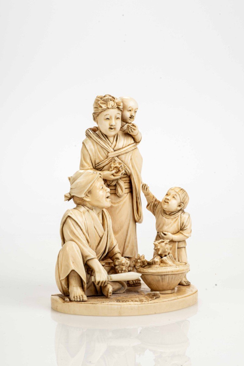 An Ivory Okimono Depicting A Seafood Vendor With His Family-photo-1