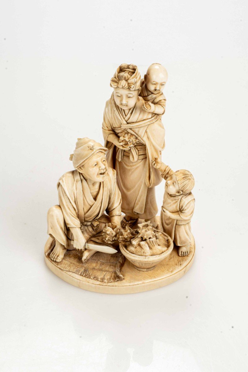 An Ivory Okimono Depicting A Seafood Vendor With His Family-photo-2