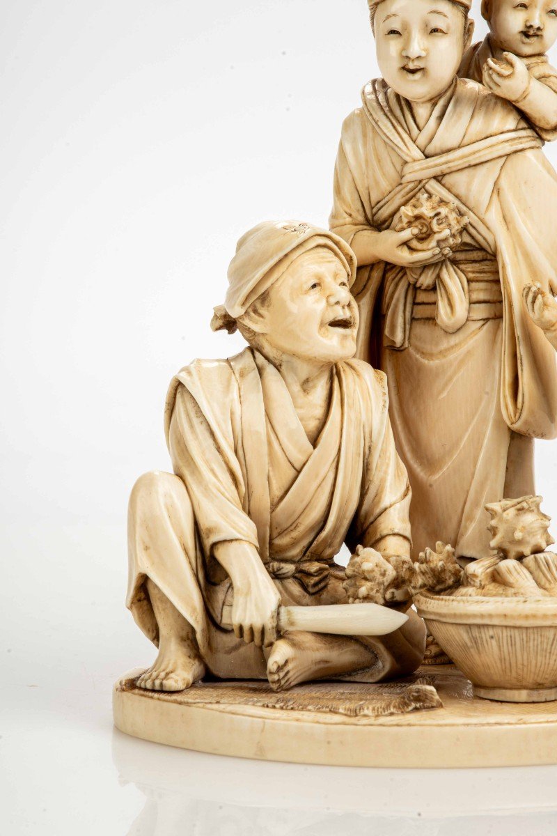 An Ivory Okimono Depicting A Seafood Vendor With His Family-photo-3