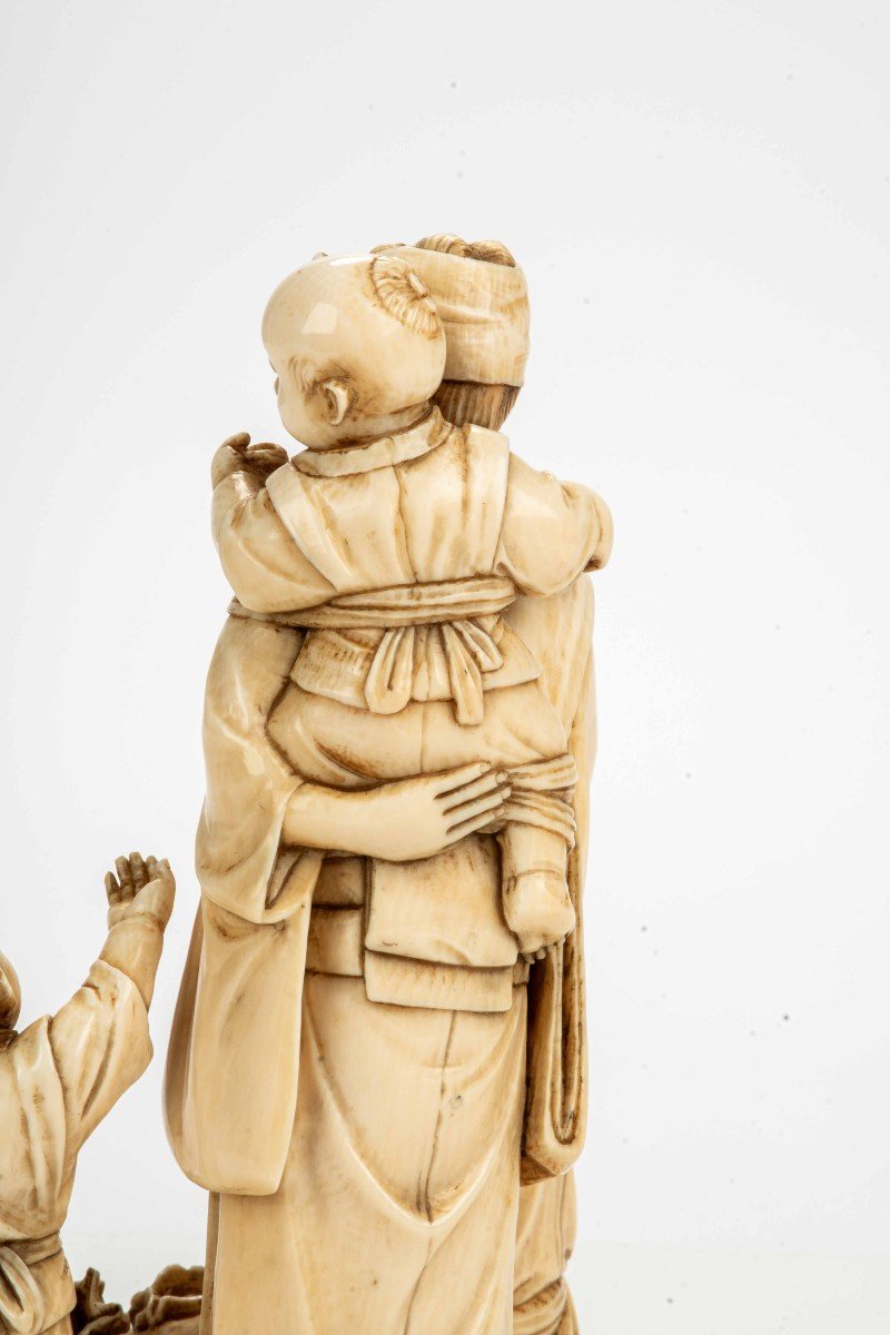 An Ivory Okimono Depicting A Seafood Vendor With His Family-photo-6