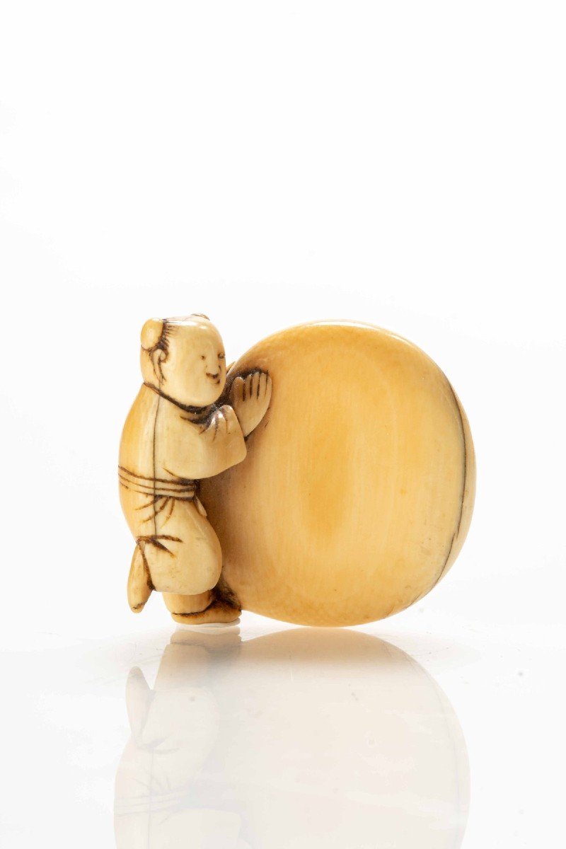 An Ivory Netsuke Depicting A Karako