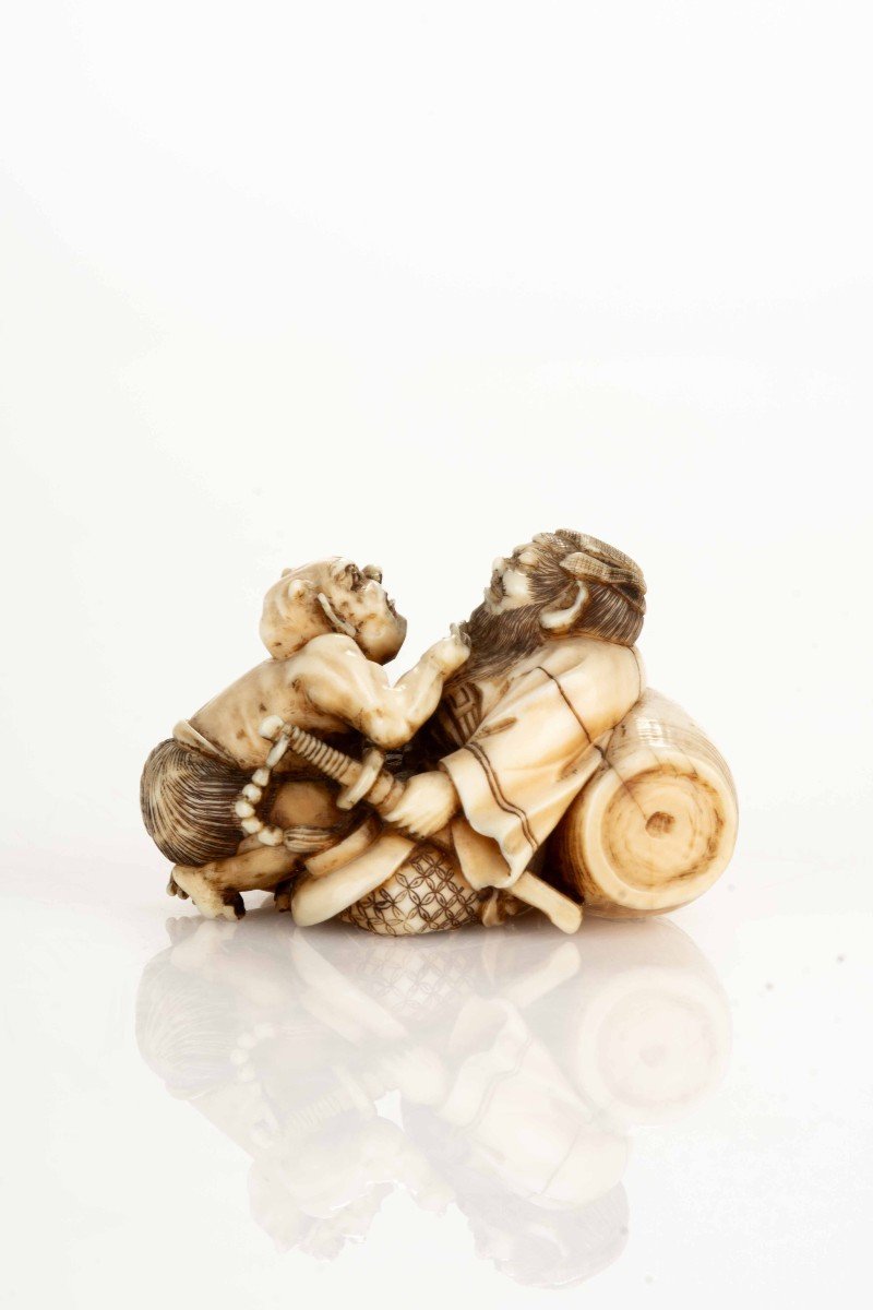 An Ivory Netsuke Depicting Shoki With An Oni-photo-2