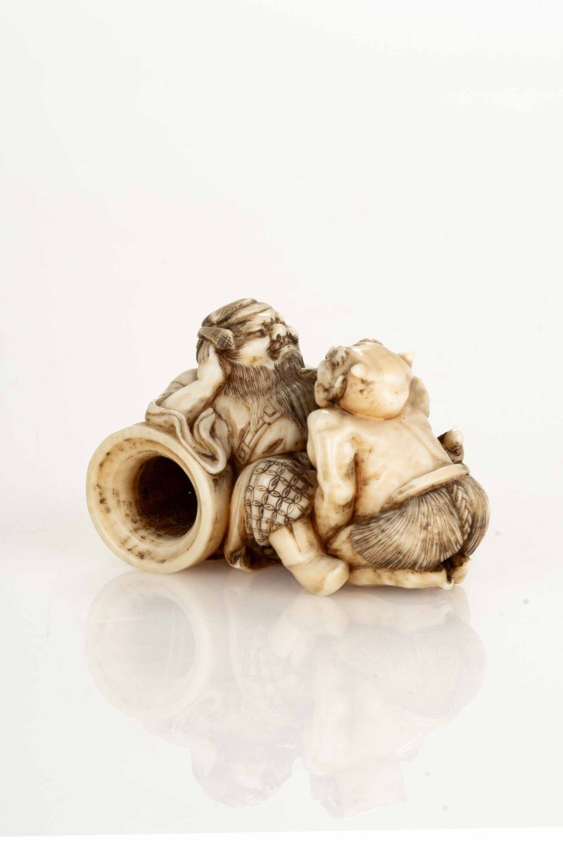 An Ivory Netsuke Depicting Shoki With An Oni-photo-1