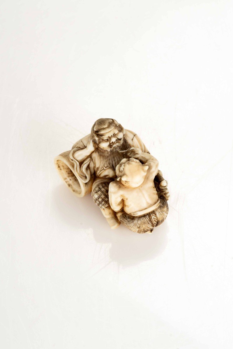 An Ivory Netsuke Depicting Shoki With An Oni-photo-3