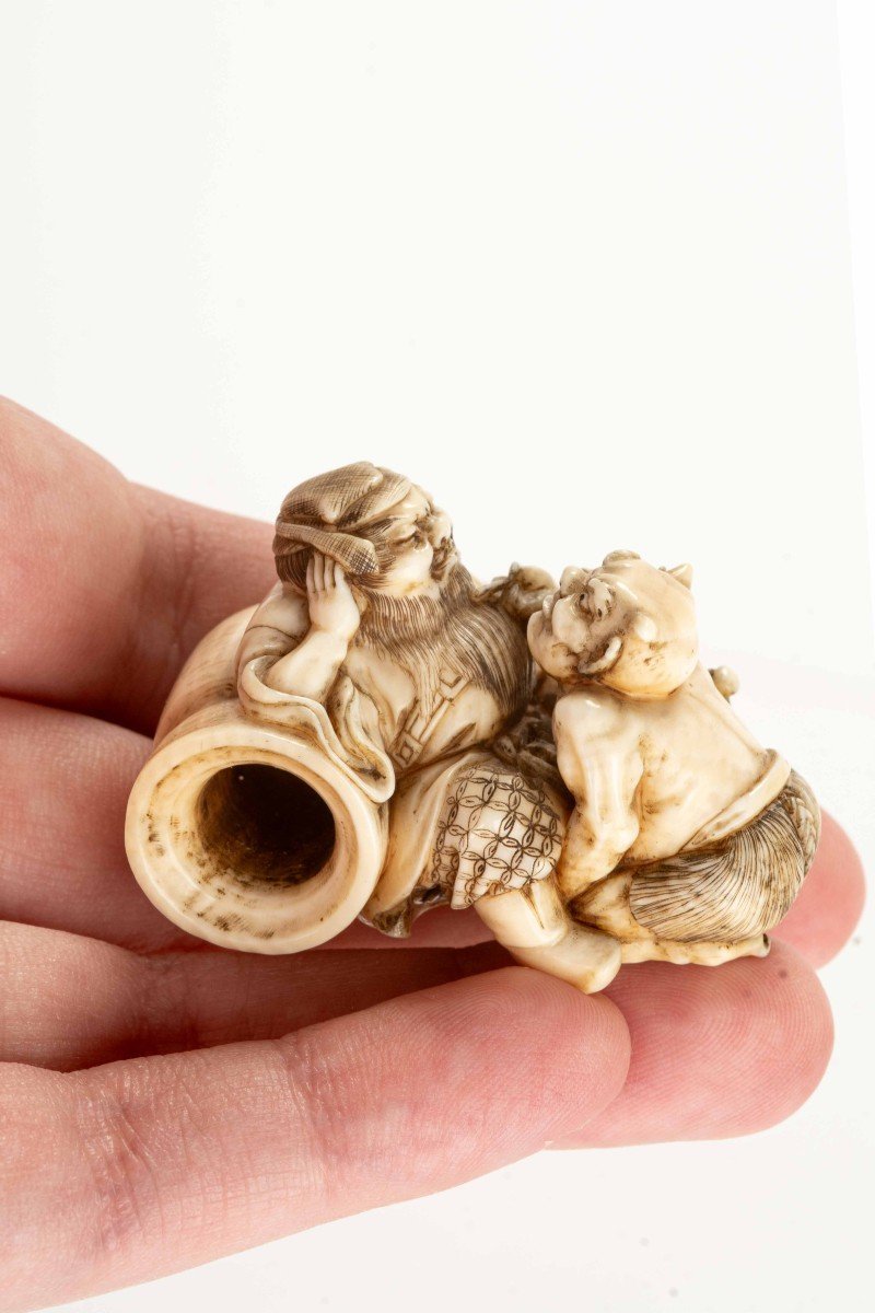 An Ivory Netsuke Depicting Shoki With An Oni-photo-5