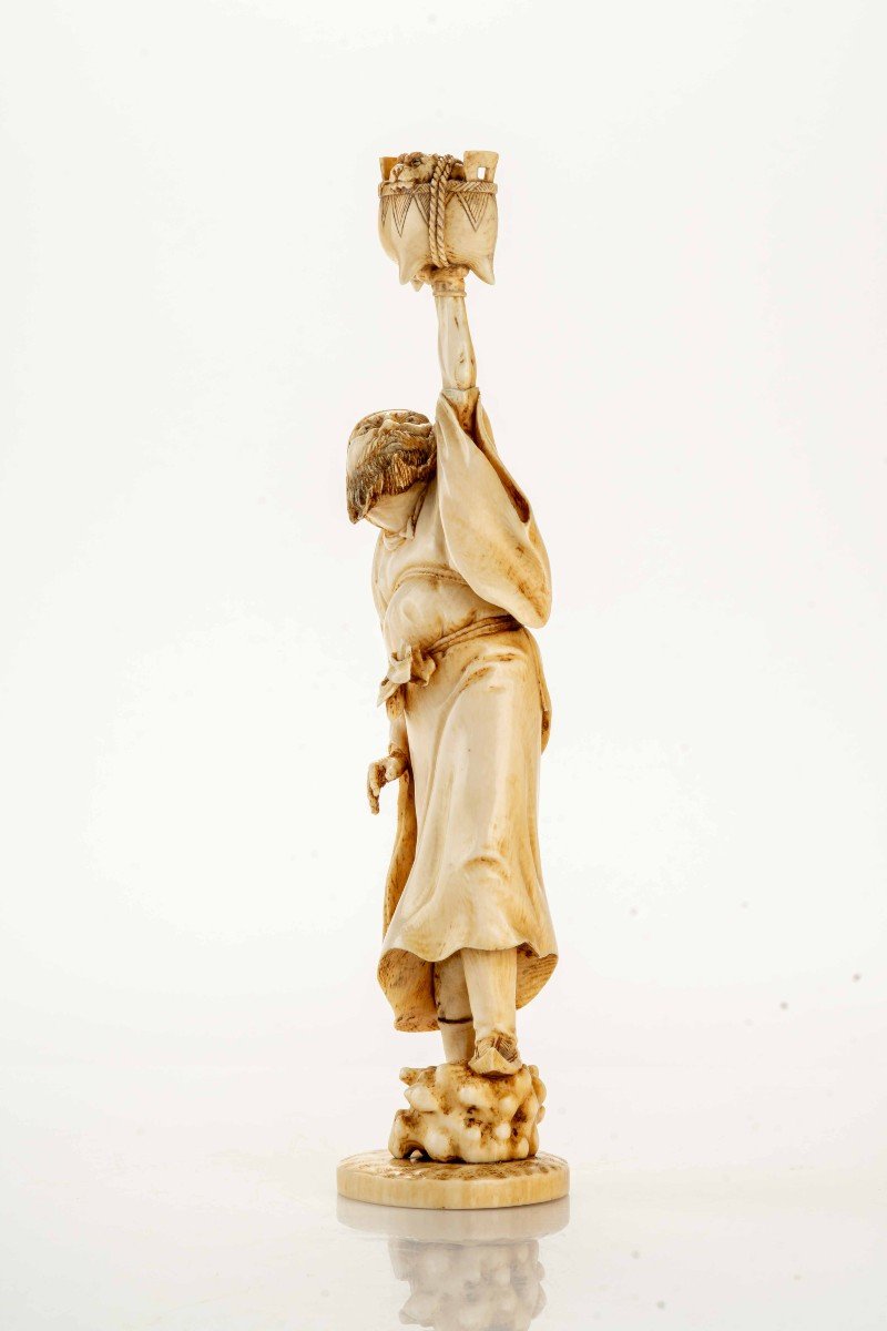 An Ivory Okimono Depicting A Standing Shoki Holding A Large Koro-photo-2