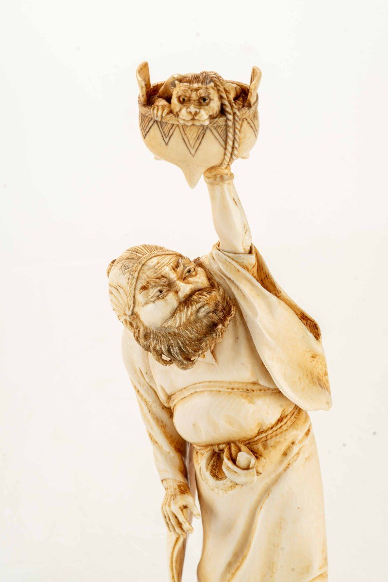 An Ivory Okimono Depicting A Standing Shoki Holding A Large Koro-photo-1