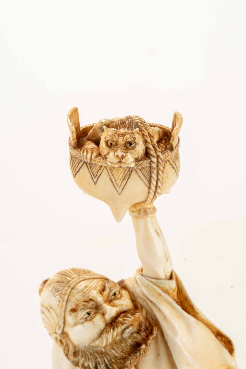 An Ivory Okimono Depicting A Standing Shoki Holding A Large Koro-photo-2