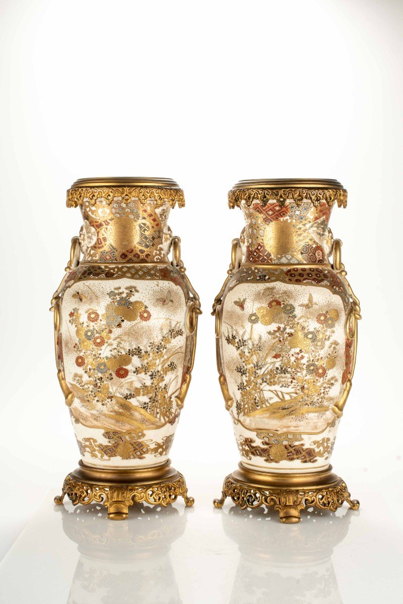 A Pair Of Satsuma Ceramic Vases With Scenes Of Children And Flowers