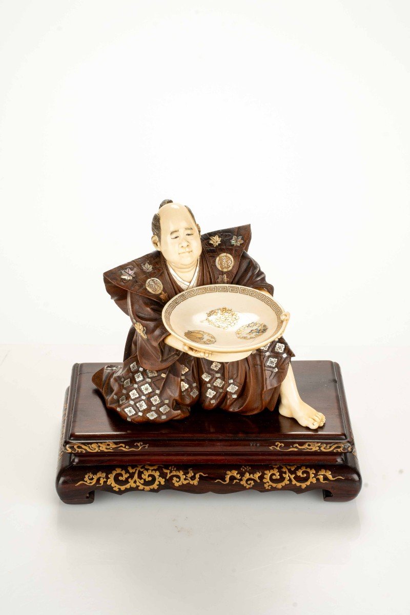 An Okimono Depicting A Sumo Wrestler, Signed Miyao