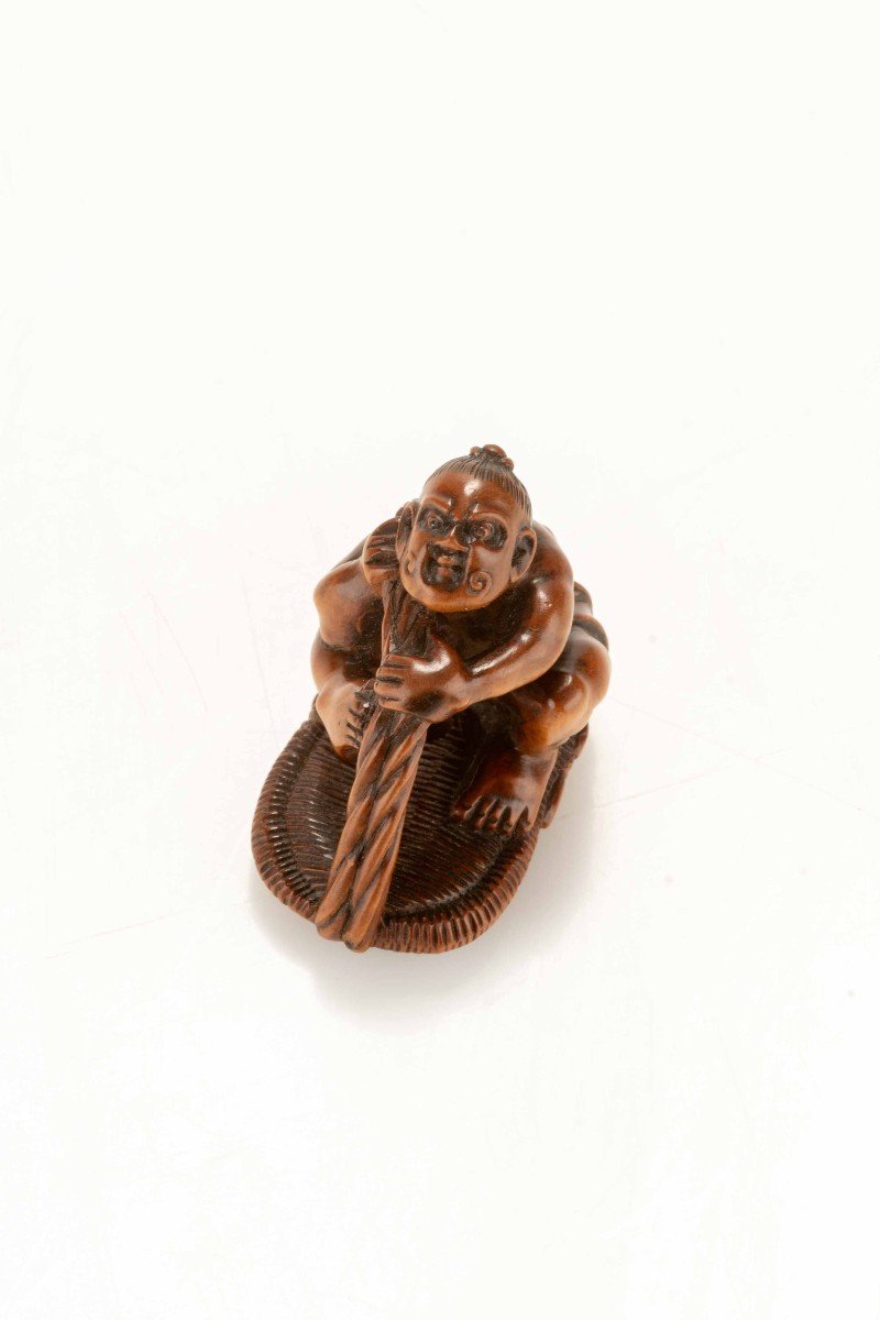 A Boxwood Netsuke Depicting A Nio With A Giant Sandal-photo-1