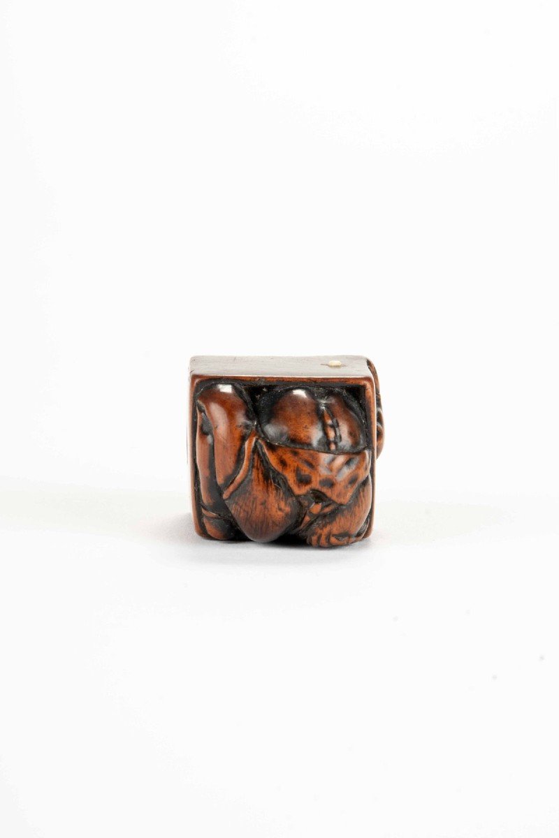 A Boxwood Netsuke Depicting An Oni Crouching Inside A Box-photo-3