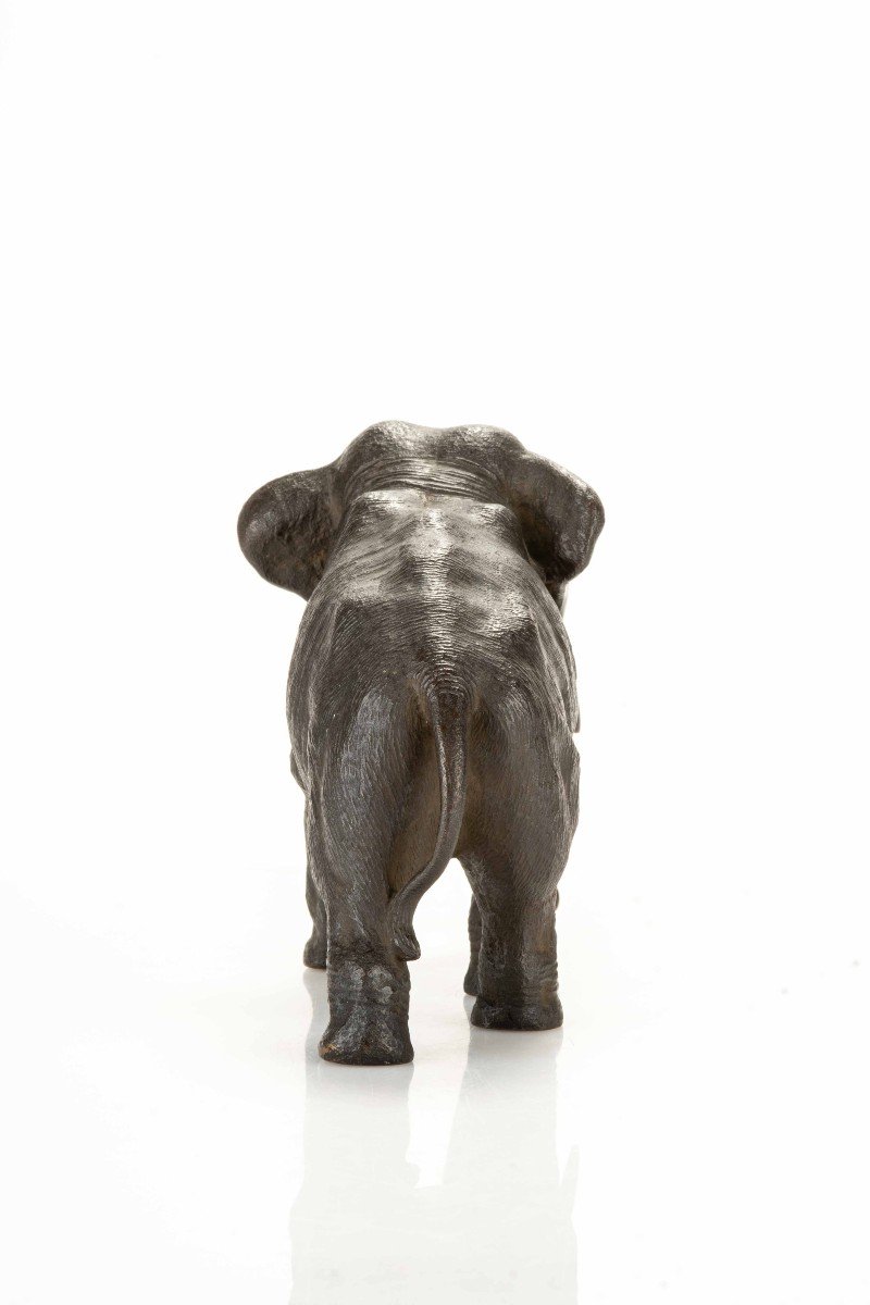 A Bronze Okimono Depicting A Walking Elephant-photo-4