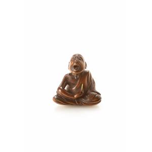 A Japanese Boxwood Netsuke Of A Professional Sneezer