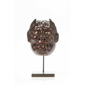 A Japanese Lacquered Wood Oni Mask