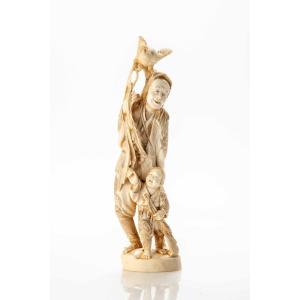 An Ivory Okimono Depicting A Hunter With Rooster And Child