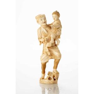 Ivory Okimono Which Portrays An Affectionate Scene Of Daily Life