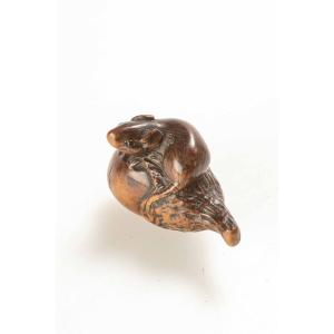 A Japanese Boxwood Netsuke Depicting A Small Mouse