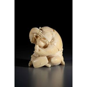 An Ivory Okimono From The Tokyo School Depicting A Monkey