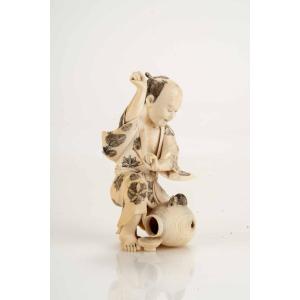 An Ivory Okimono Depicting A Man Frightened By Two Mice