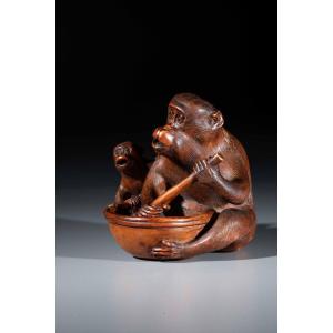 A Boxwood Okimono Depicting Two Monkeys, Signed Jigaku