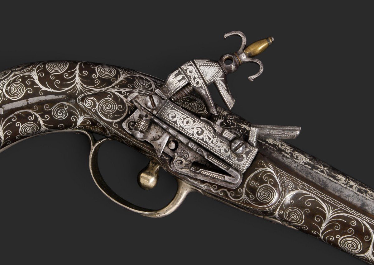 Oriental Miquelet Flintlock Pistol, Decorated With Silver Inlays, Circa 1800.