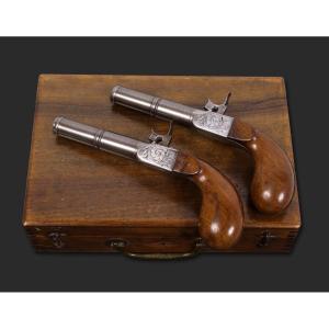 A Fine Cased Pair Of Small Percussion Pistols. France, Mid-19th Century.