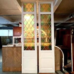 Pair Of Simple Doors With Colored Stained Glass Windows