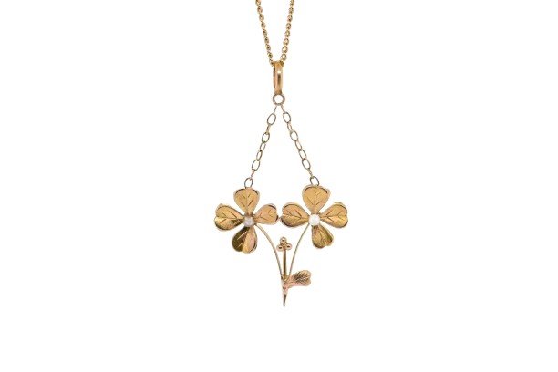 18k Gold Pendant In The Shape Of Four Leaf Clovers