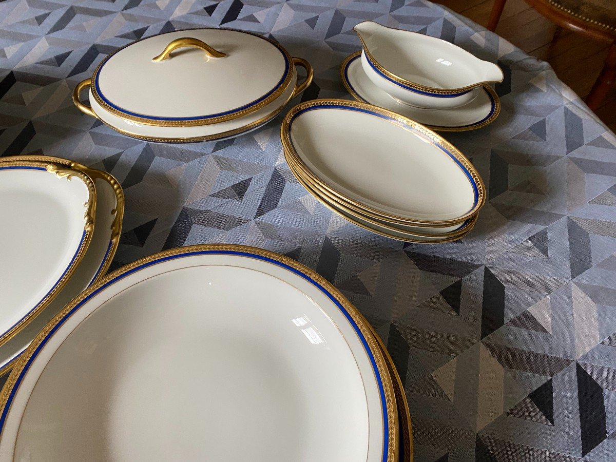 Large White Porcelain Dinner Service With Blue And Gold Trim-photo-1