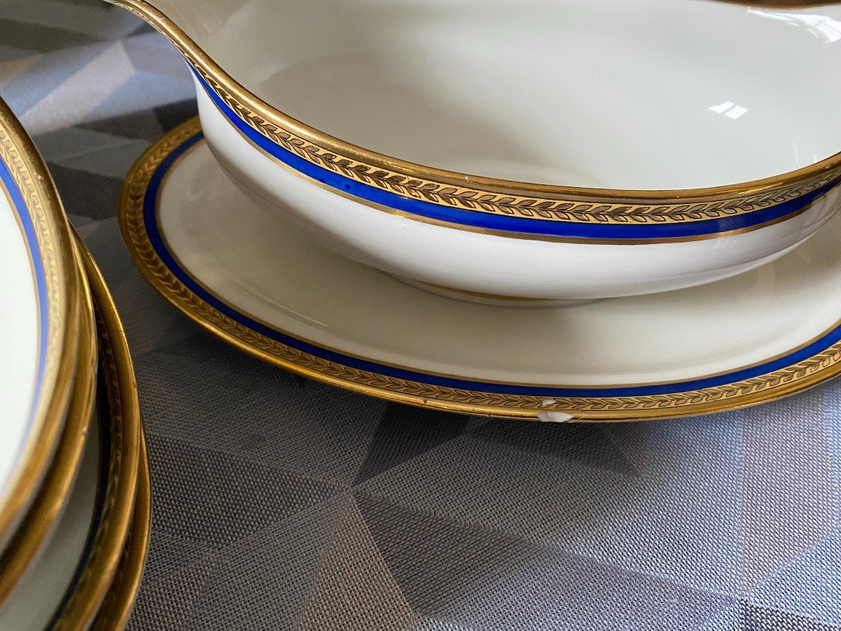 Large White Porcelain Dinner Service With Blue And Gold Trim-photo-2