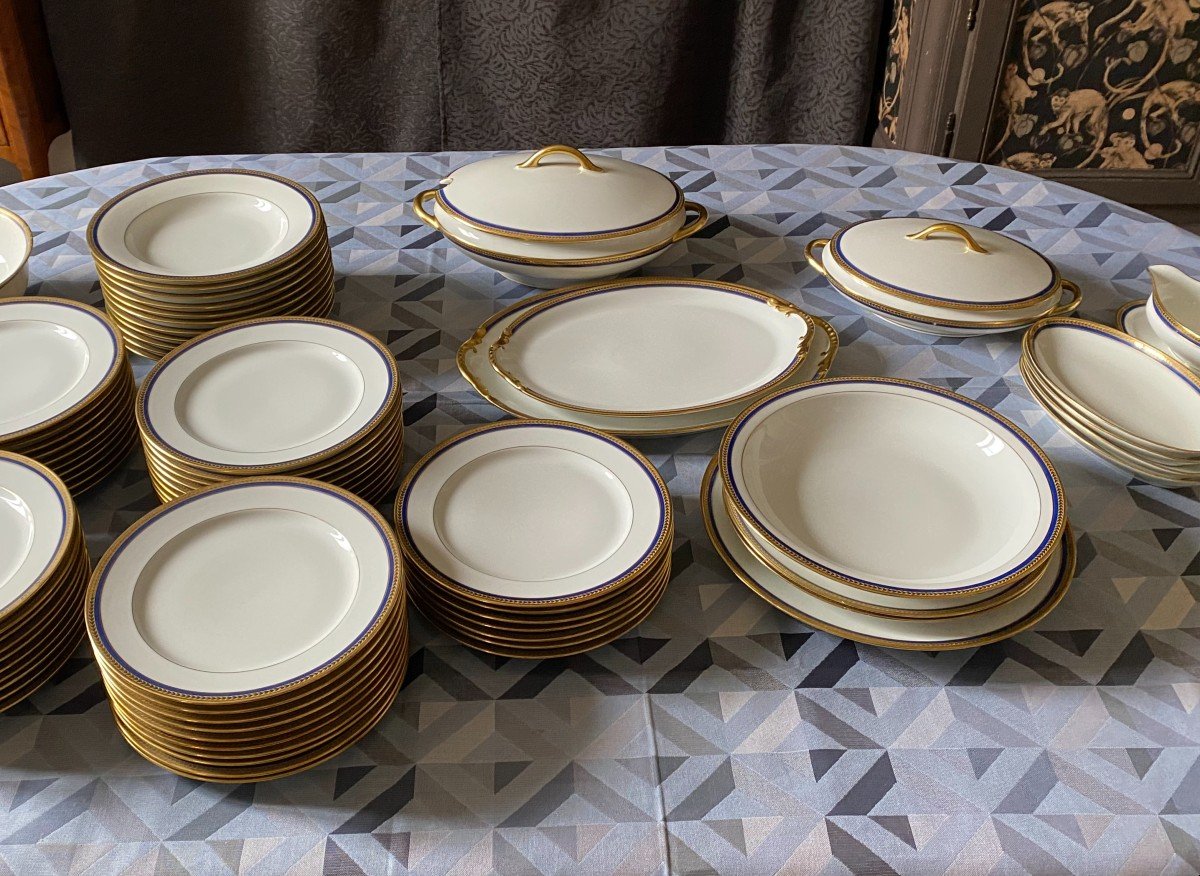 Large White Porcelain Dinner Service With Blue And Gold Trim