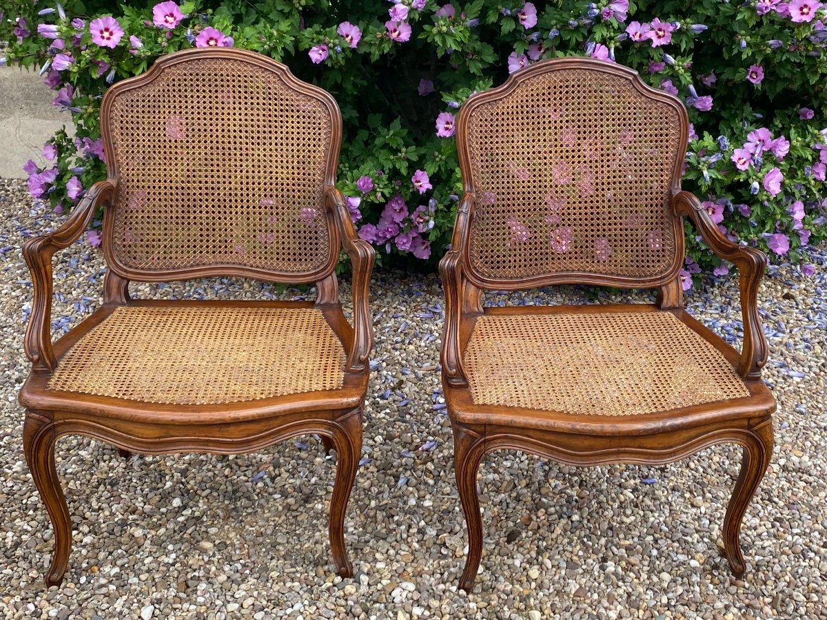 Pair Of Caned Armchairs