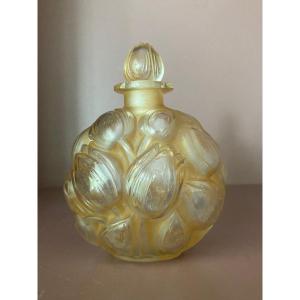 A Naughty But Charming Bottle From R.lalique For Jaytho