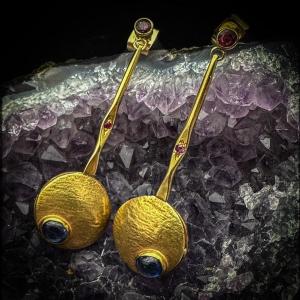 Pair Of 18k Gold Pendant Earrings Set With Sapphire And Rubies Cabochons.  