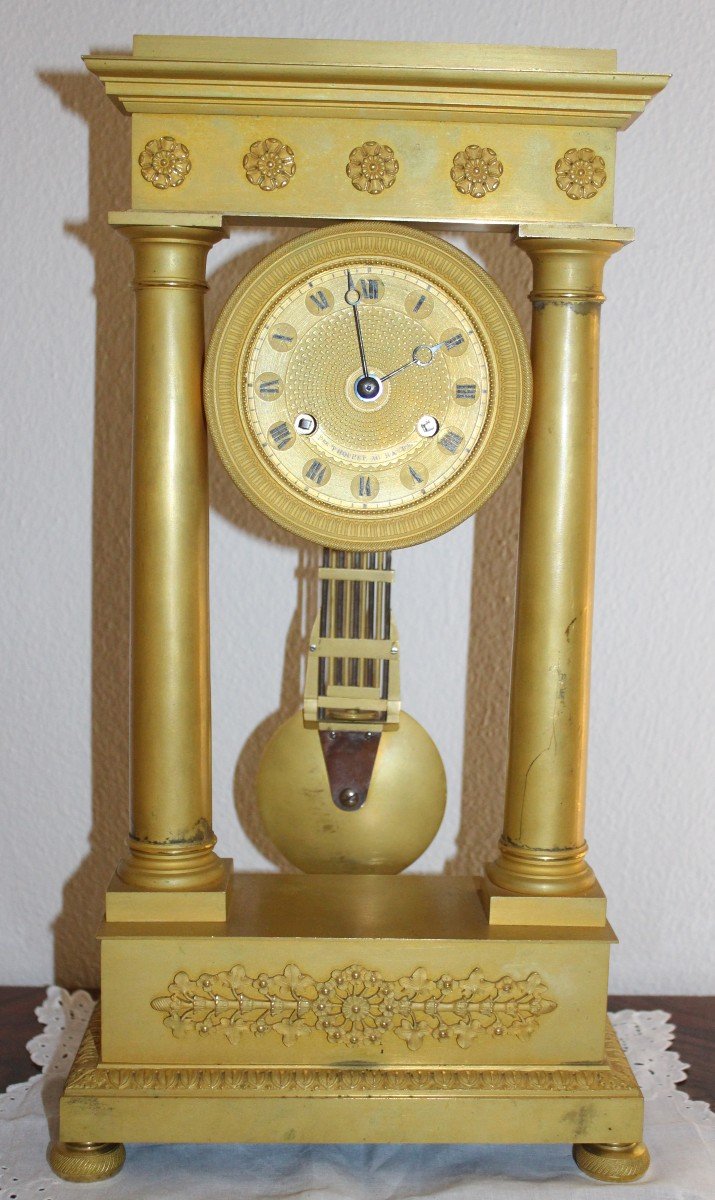 Empire Period Gilt Bronze Portico Clock.