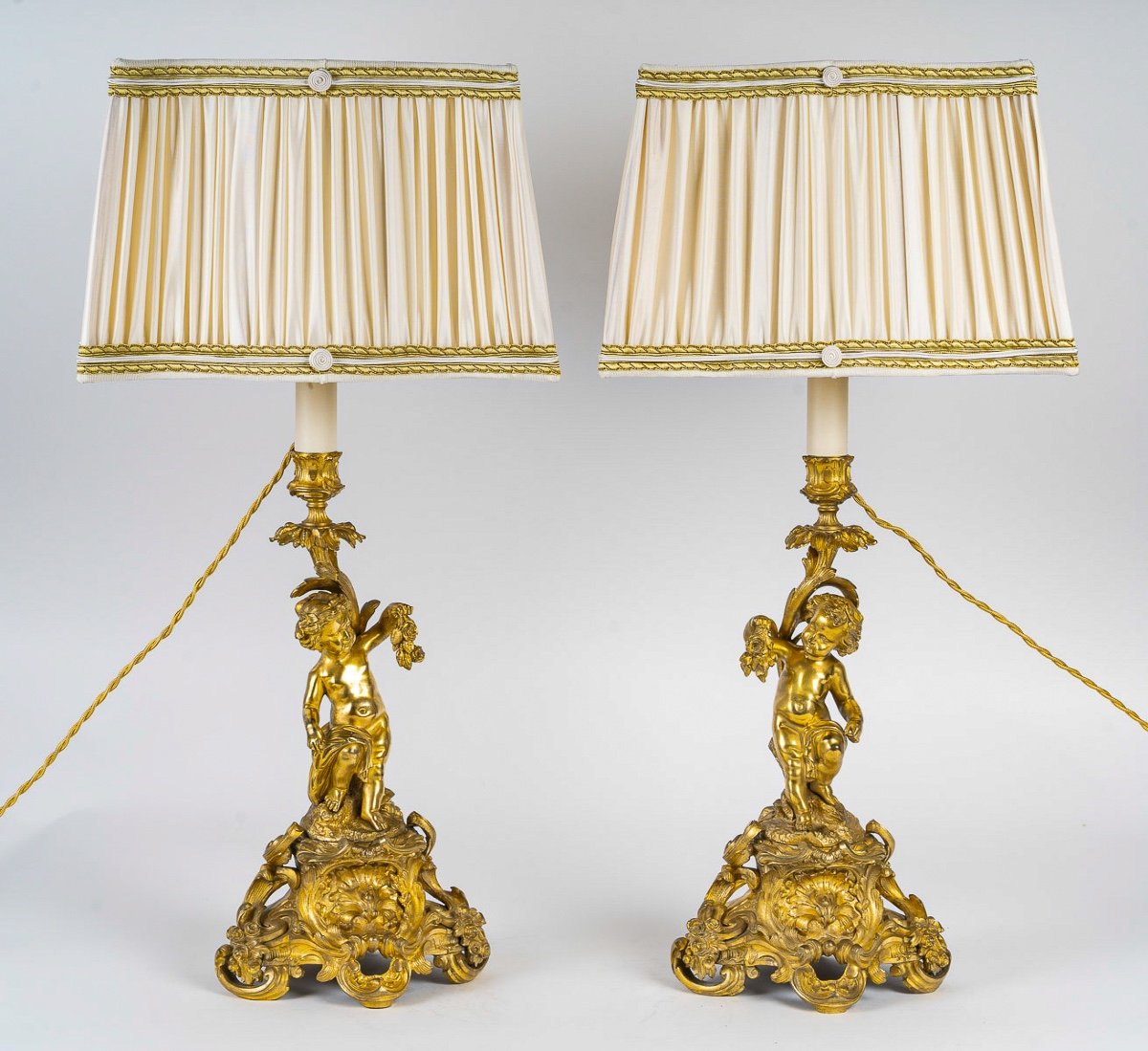 Pair Of Napoleon III Period Gilded And Chiseled Bronze Candlesticks With Putti, Mounted As Lamps