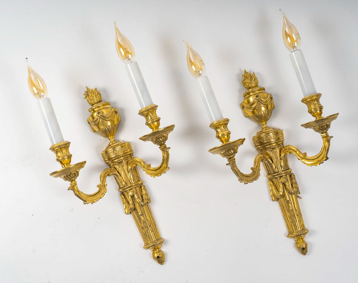 Pair Of Louis XVI Style Two-light Wall Sconces In Gilded And Chiseled Bronze, Circa 1780-1790