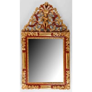 Carved Wood, Lacquered And Gilded Openwork Pediment Mirror Decorated With A Putto Musician 