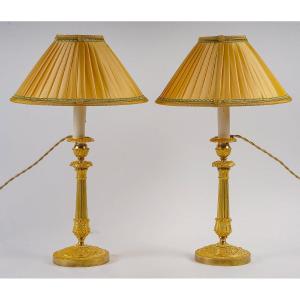 French Restoration Period Pair Of Chiseled Gilt Bronze Candlesticks Mounted As Lamps Circa 1820