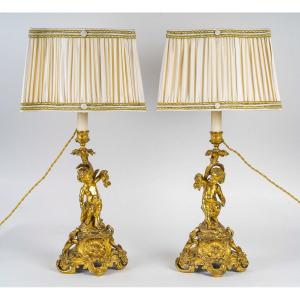 Pair Of Napoleon III Period Gilded And Chiseled Bronze Candlesticks With Putti, Mounted As Lamps