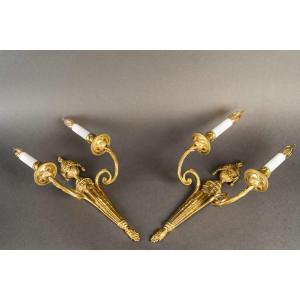 Pair Of Louis XVI Style Two-light Wall Sconces In Gilded And Chiseled Bronze, Circa 1830-1850