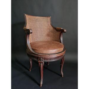 Georges Jacob, Exceptional Stamped Swivel Armchair From The Louis XVI Period. 