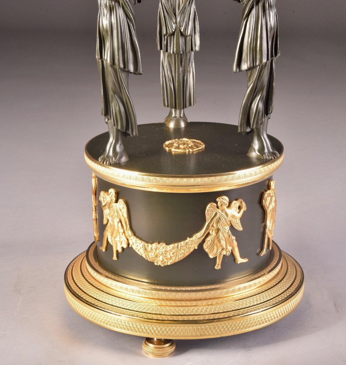 A Large Patinated And Gilded French Empire Table Centerpiece With Three Standing Winged Victories-photo-7